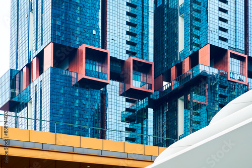 Photography Modern architecture facade reflecting blue sky in kuala lumpur malaysia