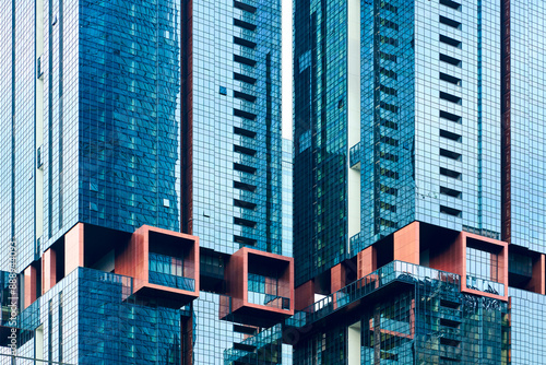 Photography Modern architecture facade reflecting blue sky in kuala lumpur malaysia