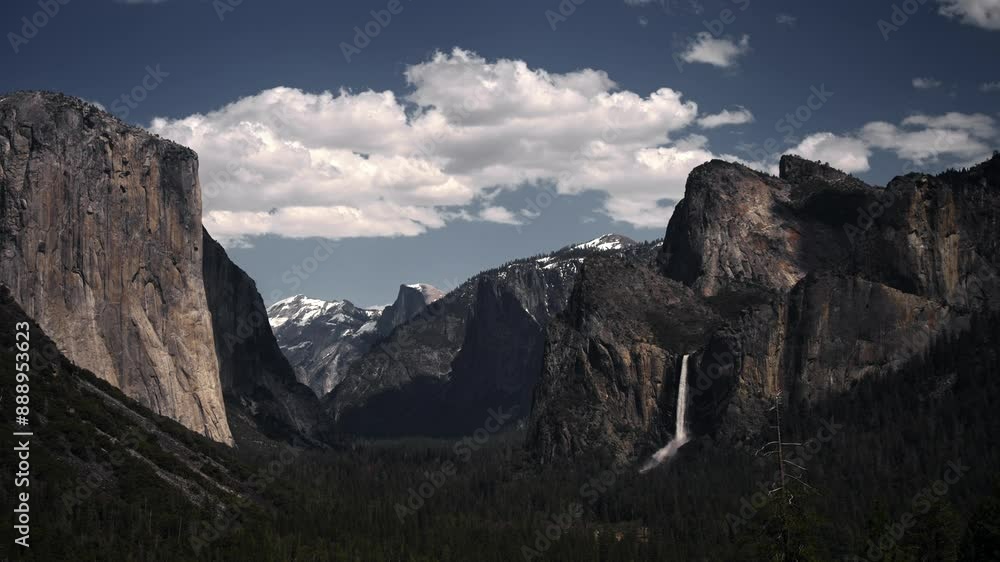 Yosemite valley tunnel view during summer with white fluffy clouds in the sky Yosemite valley tunnel view during summer with white fluffy clouds in the sky