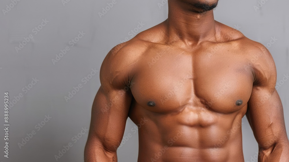 Fototapeta premium Fitness enthusiast with defined physique practicing endurance, powerful gym training session, high force energy