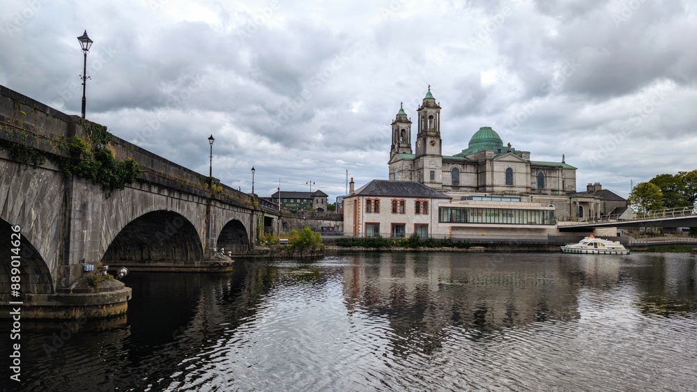 Beautiful old cityscape scenery, Church of Saints Peter & Paul by Shannon river at Athlone, town in Westmeath, Ireland, landmark and architecture background