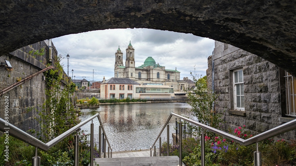 Beautiful old cityscape scenery, Church of Saints Peter & Paul by Shannon river at Athlone, town in Westmeath, Ireland, landmark and architecture background
