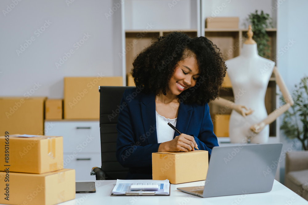 Successful Woman start up online seller at workplace. small business entrepreneur SME or freelance asian woman working with box at home. Successful Woman start up online seller at workplace. small business entrepreneur SME or freelance asian woman working with box at home.