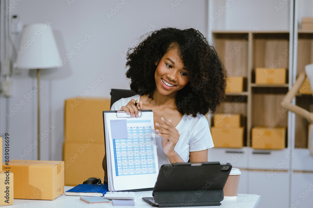 Successful Woman start up online seller at workplace. small business entrepreneur SME or freelance asian woman working with box at home. Successful Woman start up online seller at workplace. small business entrepreneur SME or freelance asian woman working with box at home.