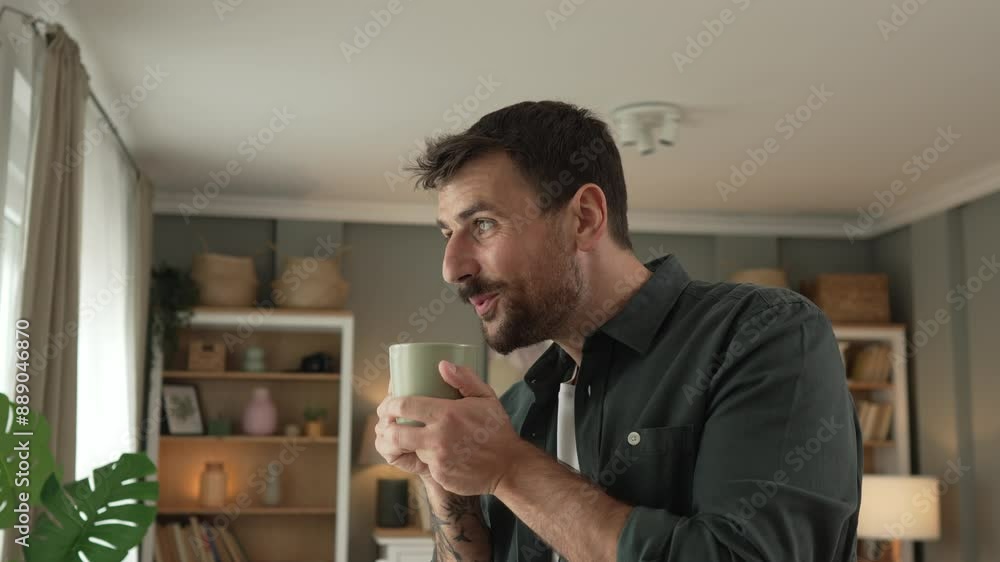 Portrait of adult handsome man drink first coffee in the living room Portrait of adult handsome man drink first coffee in the living room