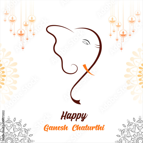 The  focuses on Ganesha's head, featuring a large curved left tusk and a broken right tusk his large ears flare out, and he wears a jeweled crown his trunk curls over his head, ending in a small curl