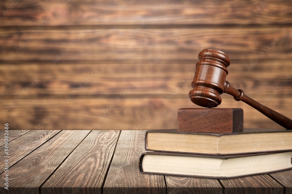 Law concept, law book with classic wooden judges gavel Law concept, law book with classic wooden judges gavel