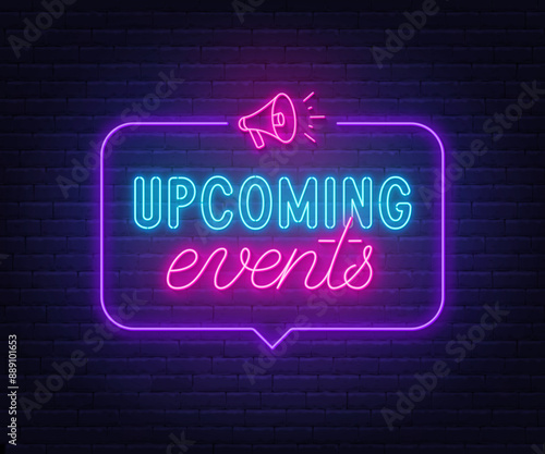 Upcoming Event neon sign in speech bubble on brick wall background. Light text announcement.