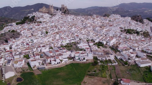 Aerial view of colourful salt pans and white buildings in Olhao, Faro, Portugal.