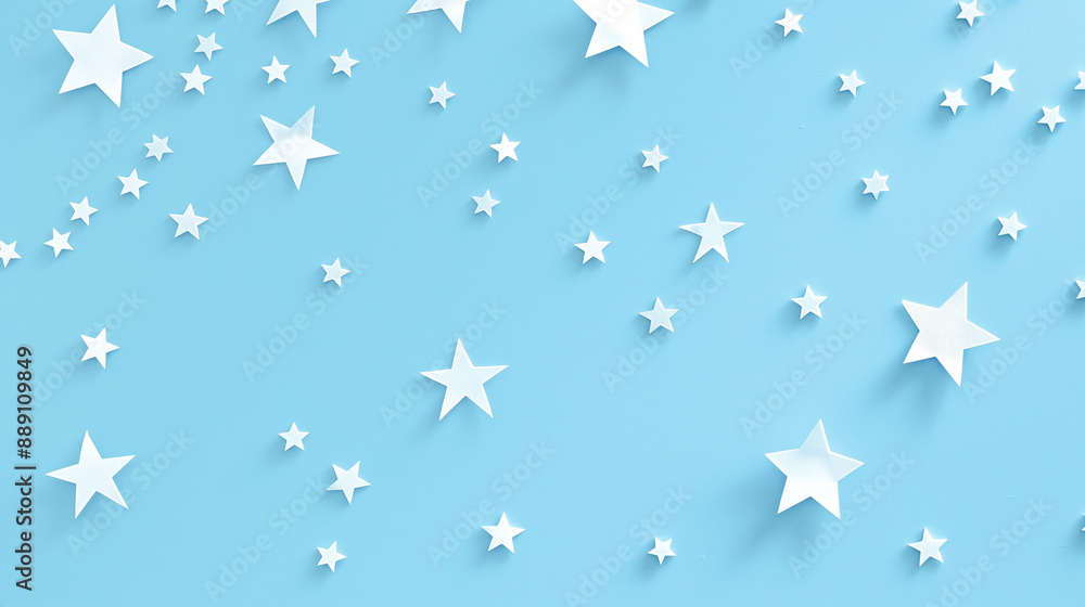 Obraz premium White stars of different sizes on a light blue background for wallpaper or paper.