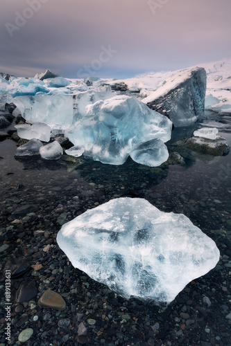 Wallpaper Mural Ice iceberg pieces near the Diamond Beach in Iceland, at Jökulsárlón glacier lagoon, famous landmark in Iceland, natural reserve Torontodigital.ca