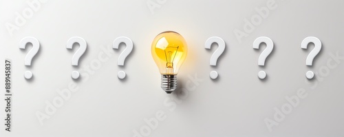 A row of question marks leading up to a light bulb at the end, symbolizing the path to finding answers, on an isolated white background, with lots of copy space