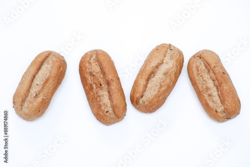 Appetizing rye buns on white background