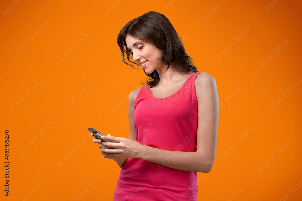 Young smiling happy woman hold phone Young smiling happy woman hold phone