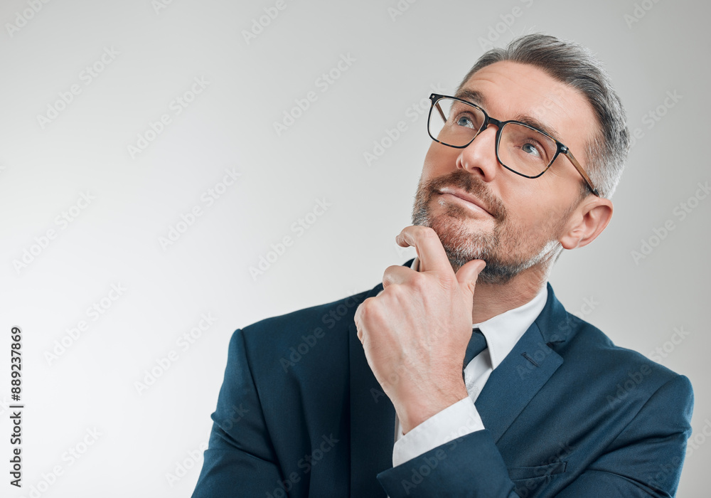 Thinking, business man and work idea with decision and considering choice in studio. Working, corporate person and professional with mature entrepreneur planning for solution with white background Thinking, business man and work idea with decision and considering choice in studio. Working, corporate person and professional with mature entrepreneur planning for solution with white background