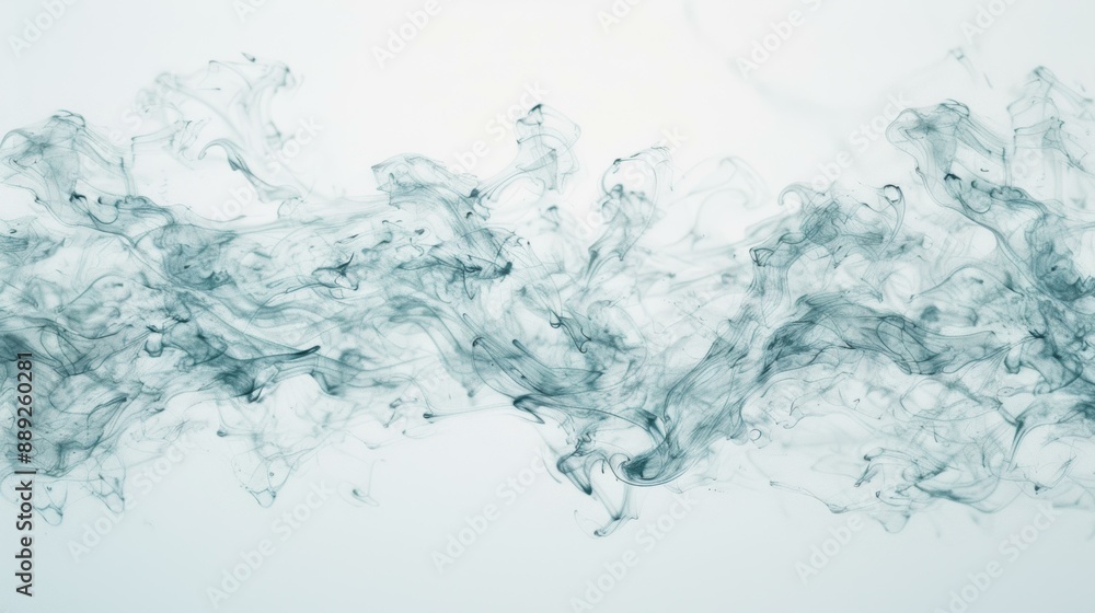 Abstract image of blue ink swirls forming organic shapes in water, creating a dynamic and fluid background. Abstract image of blue ink swirls forming organic shapes in water, creating a dynamic and fluid background.