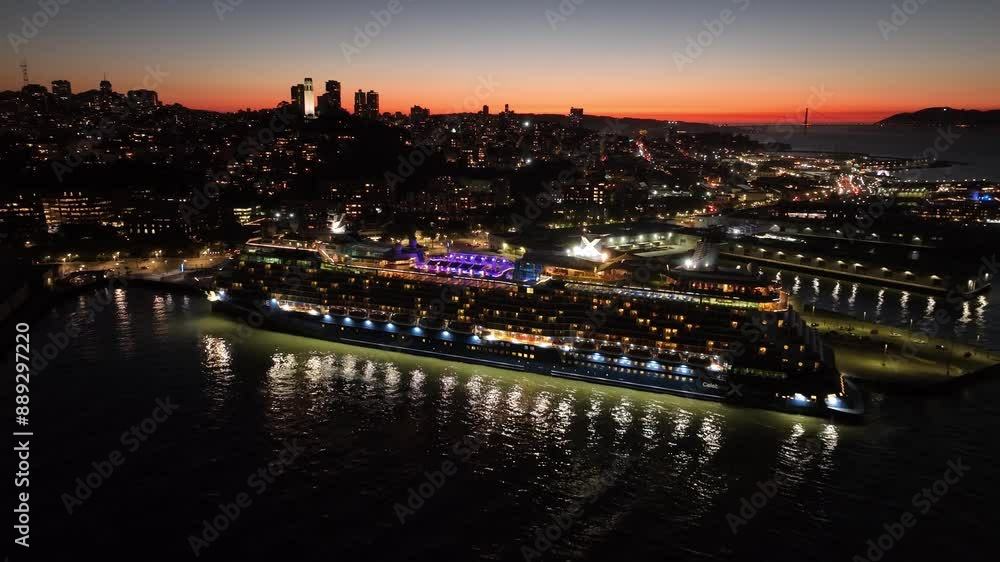 Sunset Cruise Ship At San Francisco California United States. Large White Cruise Ship Is Sailing On A Calm Blue Ocean. Building Metropolitan Landscape Company Building Busy. Sunset Cruise Ship At San Francisco California United States. Large White Cruise Ship Is Sailing On A Calm Blue Ocean. Building Metropolitan Landscape Company Building Busy.
