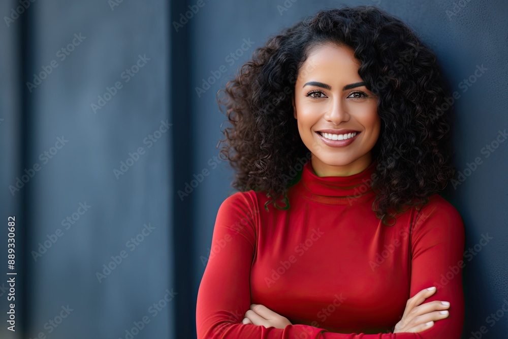 Young latin woman with pleasant smile and crossed arms. Young latin woman with pleasant smile and crossed arms.