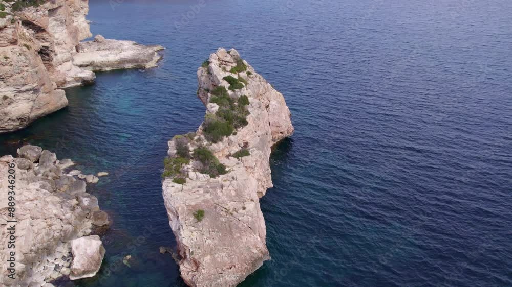 Aerial view of majestic rock formation along the coast of Es Pontas, Mallorca, Spain.