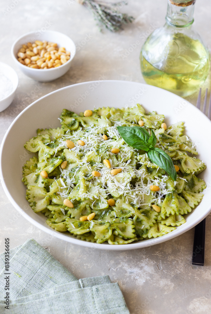Farfalle pasta with pesto sauce. Healthy eating. Vegetarian food. Farfalle pasta with pesto sauce. Healthy eating. Vegetarian food.