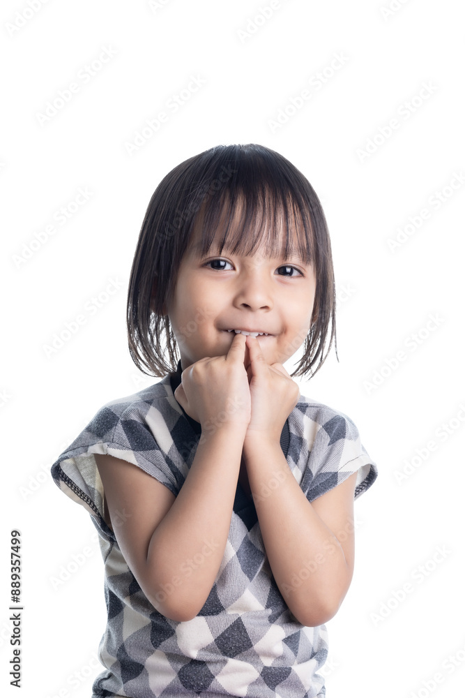 Asian girl sucks her finger and shy smile isolated on white background with clipping path. Asian girl sucks her finger and shy smile isolated on white background with clipping path.