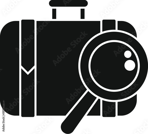 Magnifying glass is hovering over a suitcase, symbolizing a search for lost luggage