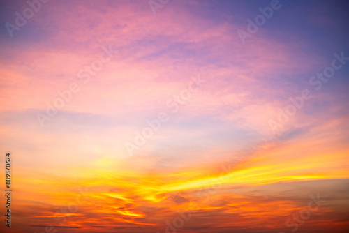 Fototapeta Naklejka Na Ścianę i Meble -  Beautiful , luxury soft gradient orange gold clouds and sunlight on the blue sky perfect for the background, take in everning,Twilight, Large size, high definition landscape photo