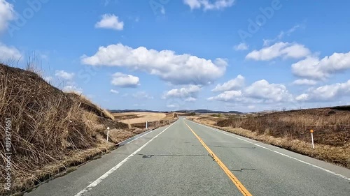 Landscape Milk road at Mount Aso is  Aso Volcano and in this sense is the largest active volcano in Aso Kumamoto Japan - golden dry grass meadow Dolly in Footage , travel Nature Outdoor 