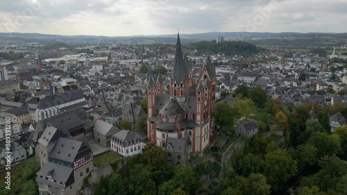 Aerial view of medieval castle, church, and cathedral overlooking river in historic Limburg an der Lahn, Germany.