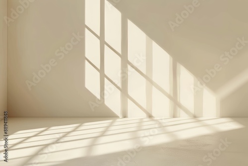 Background for product presentation with minimal abstract gentle light beige color and intricate shadows created by window and vegetation.