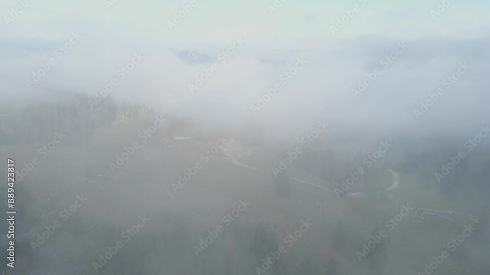 Aerial view of moody village and misty mountain plateau, Velika Planina, Slovenia. Aerial view of moody village and misty mountain plateau, Velika Planina, Slovenia.