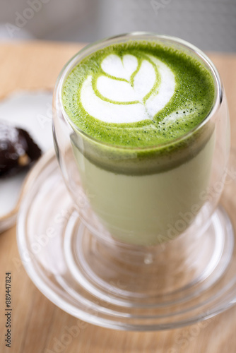 Warm and soothing hot matcha latte. A rich blend of premium matcha green tea and steamed milk, offering a creamy texture and earthy flavor. Perfect for a cozy, antioxidant-rich pick-me-up