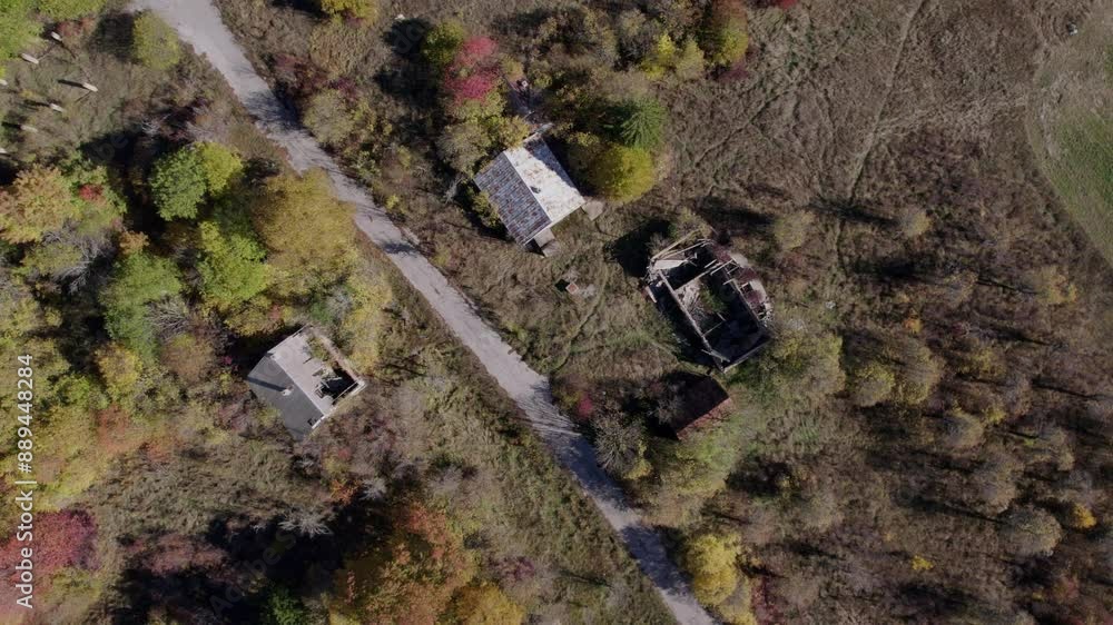 Aerial view of abandoned village with old houses and empty fields, udbina, lika-senj, croatia. Aerial view of abandoned village with old houses and empty fields, udbina, lika-senj, croatia.