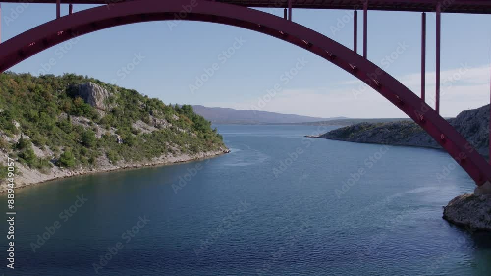 Aerial view of Maslenicki Most bridge over water with boat and road, Maslenica, Croatia. Aerial view of Maslenicki Most bridge over water with boat and road, Maslenica, Croatia.