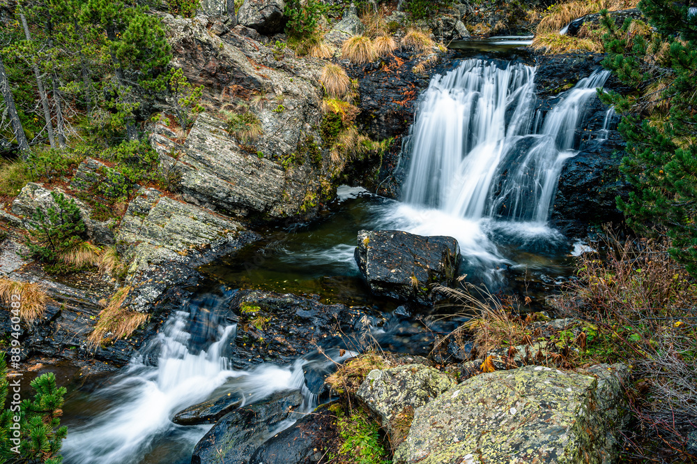 Naklejka premium Waterfall in the mountains