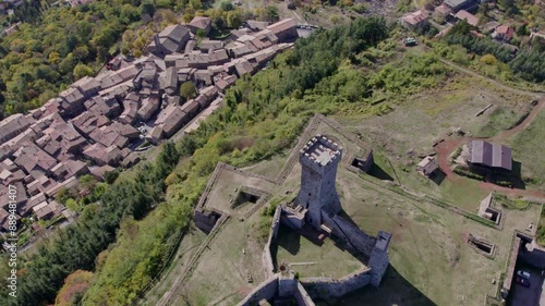 Aerial view of medieval fortress and tower in Val d'Orcia village, Radicofani, Tuscany, Italy.
