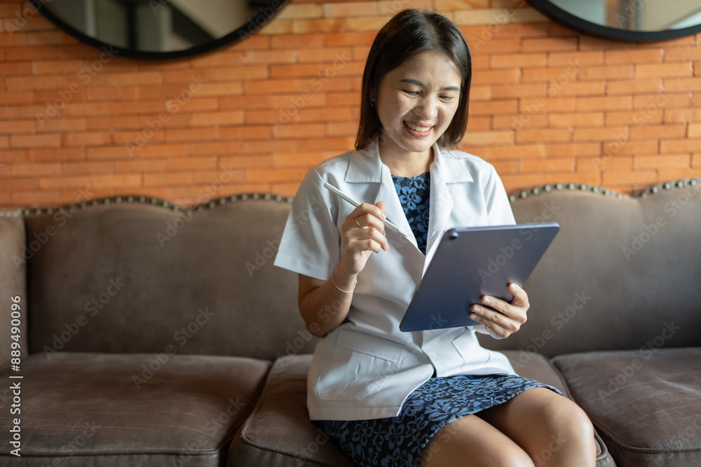 A physician's dedication to learning, she earned advanced certification and attended international medical conferences using a laptop to conduct disease research on patients. A physician's dedication to learning, she earned advanced certification and attended international medical conferences using a laptop to conduct disease research on patients.