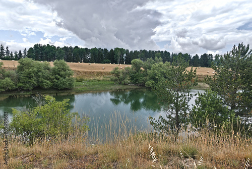 Scenic panorama of Lake Cecita in the Sila mountains in Calabria in summer photo