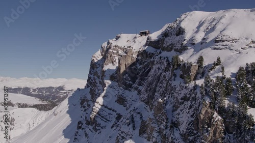 Aerial view of snowcapped mountains and autumn trees in the Dolomites, South Tyrol, Italy. photo