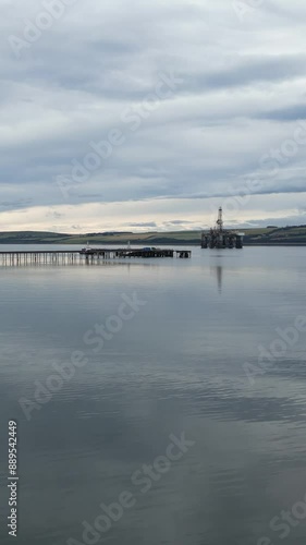 Wallpaper Mural oil rig platforms maintenance english scottish coast low altitude flying over water early morning forward aerial drone Torontodigital.ca