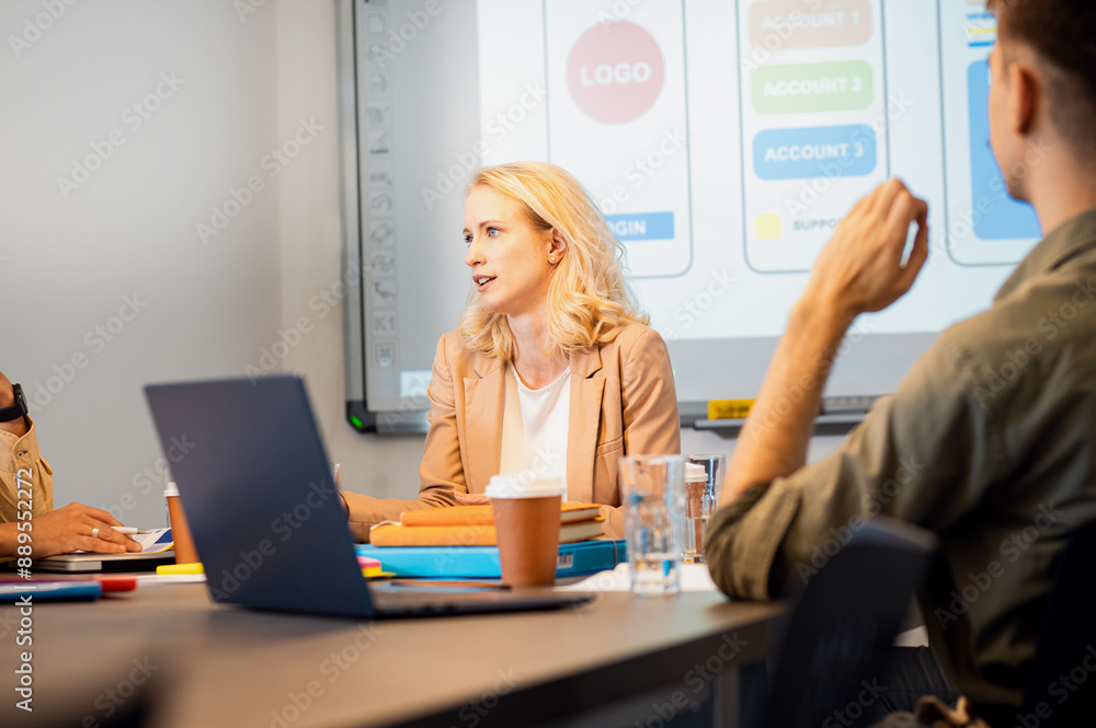 Portrait of a business woman in the office holding a meeting with a colleague. Portrait of a business woman in the office holding a meeting with a colleague.