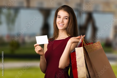 Stylish woman hold shopping bags