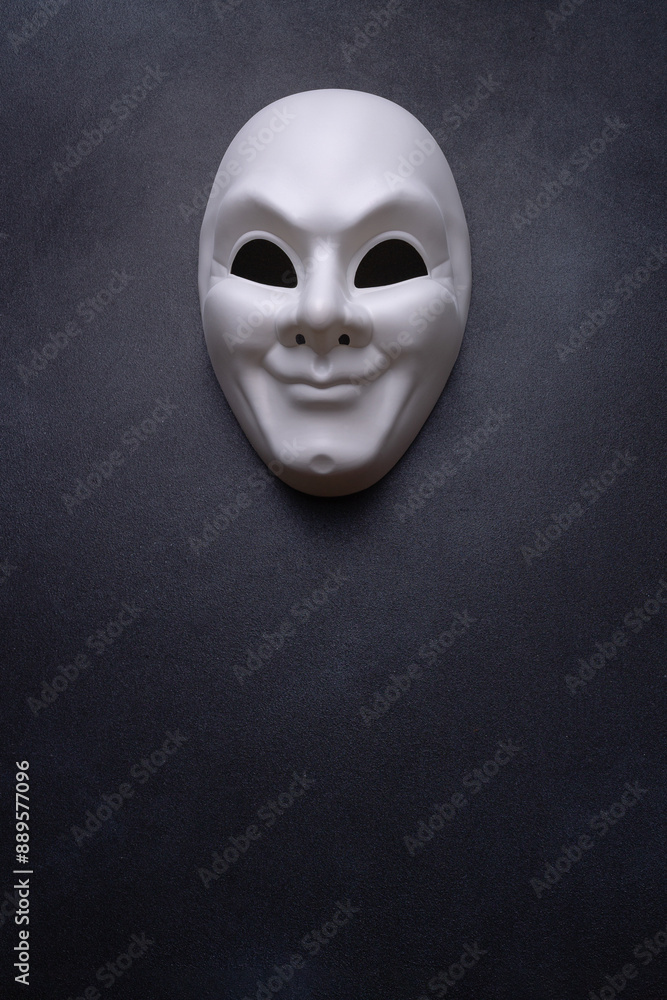 theatrical mask on a textured dark background, a copy of the space theatrical mask on a textured dark background, a copy of the space