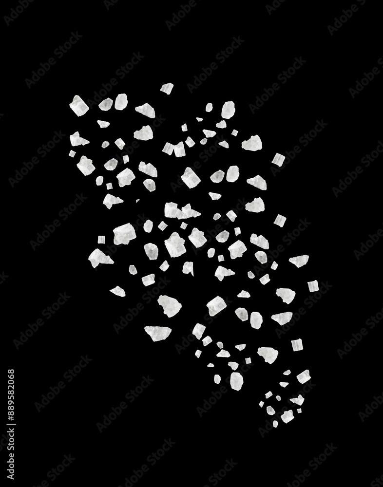Sea salt grains in air on black background Sea salt grains in air on black background