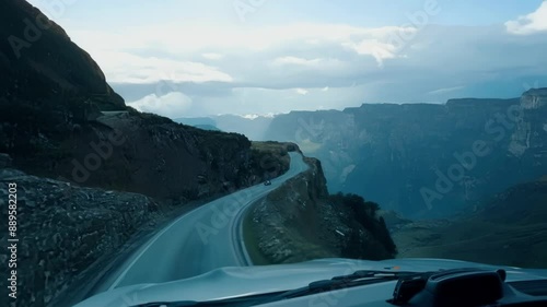 Maneuvering through the narrow alpine passes required intense focus and precise driving skills to avoid the steep dropoffs. photo