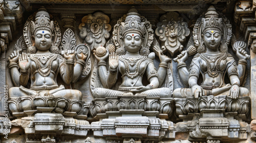 Wallpaper Mural Three statues of women are sitting on a wall Torontodigital.ca