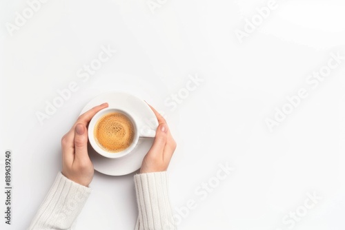 Top View of a Cup of Coffee Held by Hands