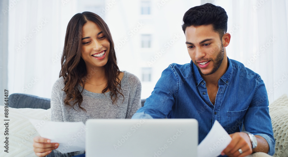 Documents, laptop and tax review with couple on sofa in living room of home for bank payment. Accounting, computer or financial paperwork with man and woman in apartment for insurance or mortgage Documents, laptop and tax review with couple on sofa in living room of home for bank payment. Accounting, computer or financial paperwork with man and woman in apartment for insurance or mortgage