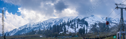 View of Apharwat Peak from Gulmarg Gondola ropeway at Kongdoori, Gulmarg, Jammu and Kashmir, India. Gulmarg Gondola is one of the highest in the world reaching 3,979 metres above sea level. photo