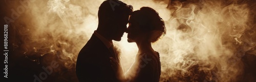 Silhouette of Couple Embracing in Smoke at a Wedding Reception